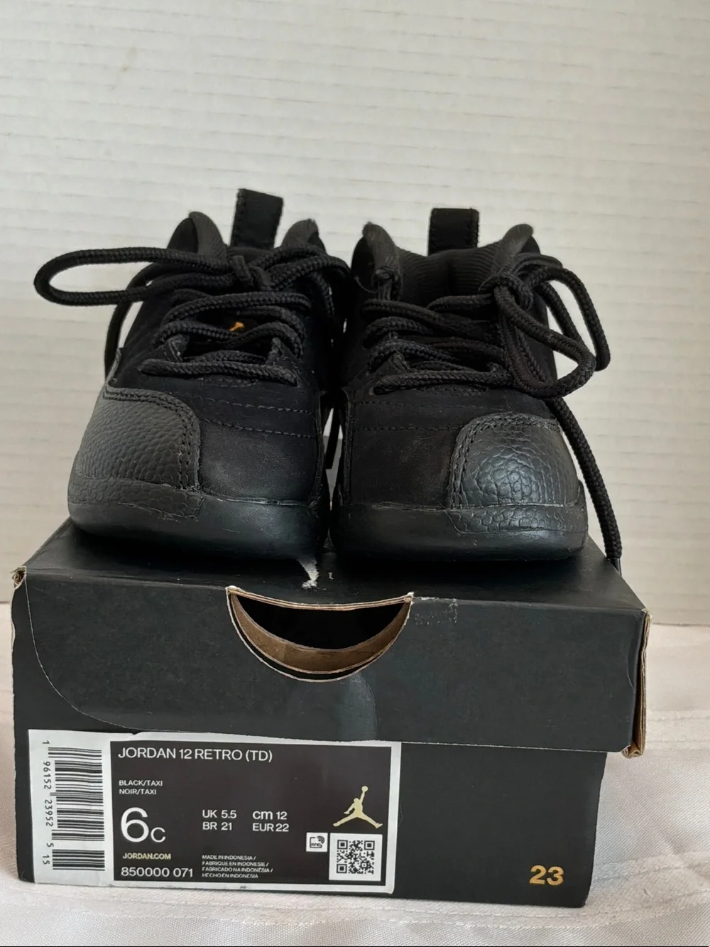 Jordan Kids Black Retro 12 Sneakers size 6c with gold sticker with box